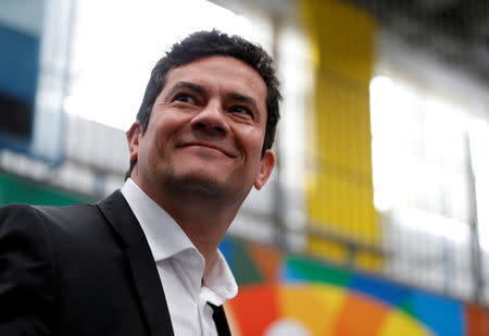 FILE PHOTO: Brazilian federal judge Sergio Moro waits to cast his vote in Curitiba, Brazil October 7, 2018. REUTERS/Rodolfo Buhrer/File Photo