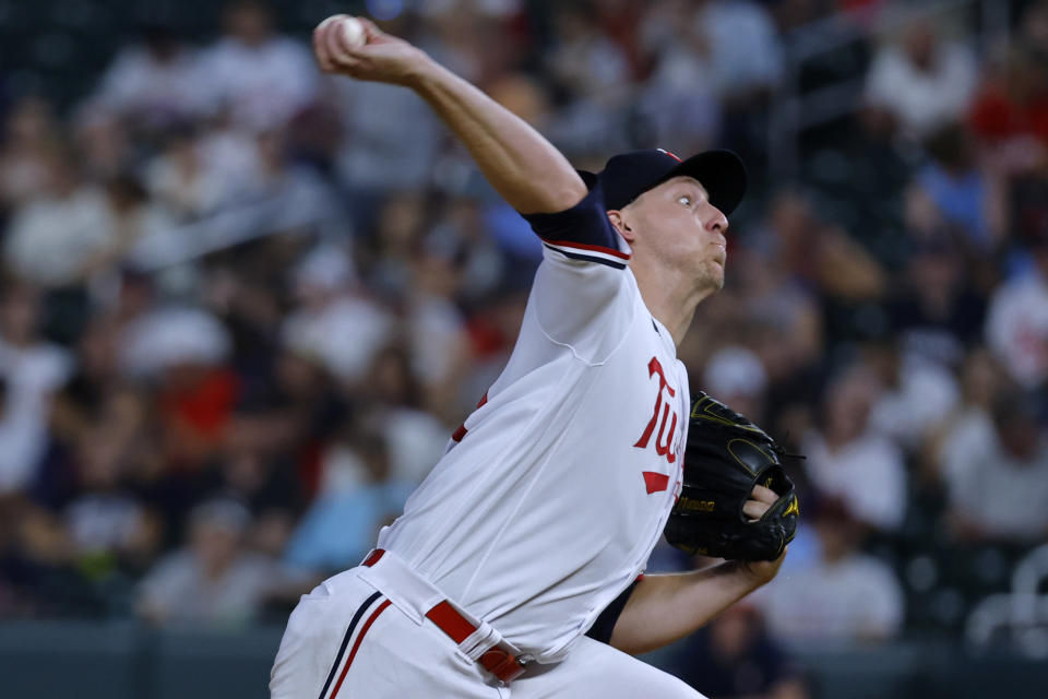 Minnesota Twins relief pitcher Josh Winder throws to a Texas Rangers batter during the eighth inning of a baseball game Thursday, Aug. 24, 2023, in Minneapolis. (AP Photo/Bruce Kluckhohn)