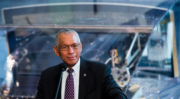 NASA Administrator Charles Bolden, who was the pilot of the space shuttle mission that launched the Hubble Space Telescope on April 24, 1990, is seen backdropped by the WFPC2 instrument at the debut of the "Repairing Hubble" exhibit at the Nati
