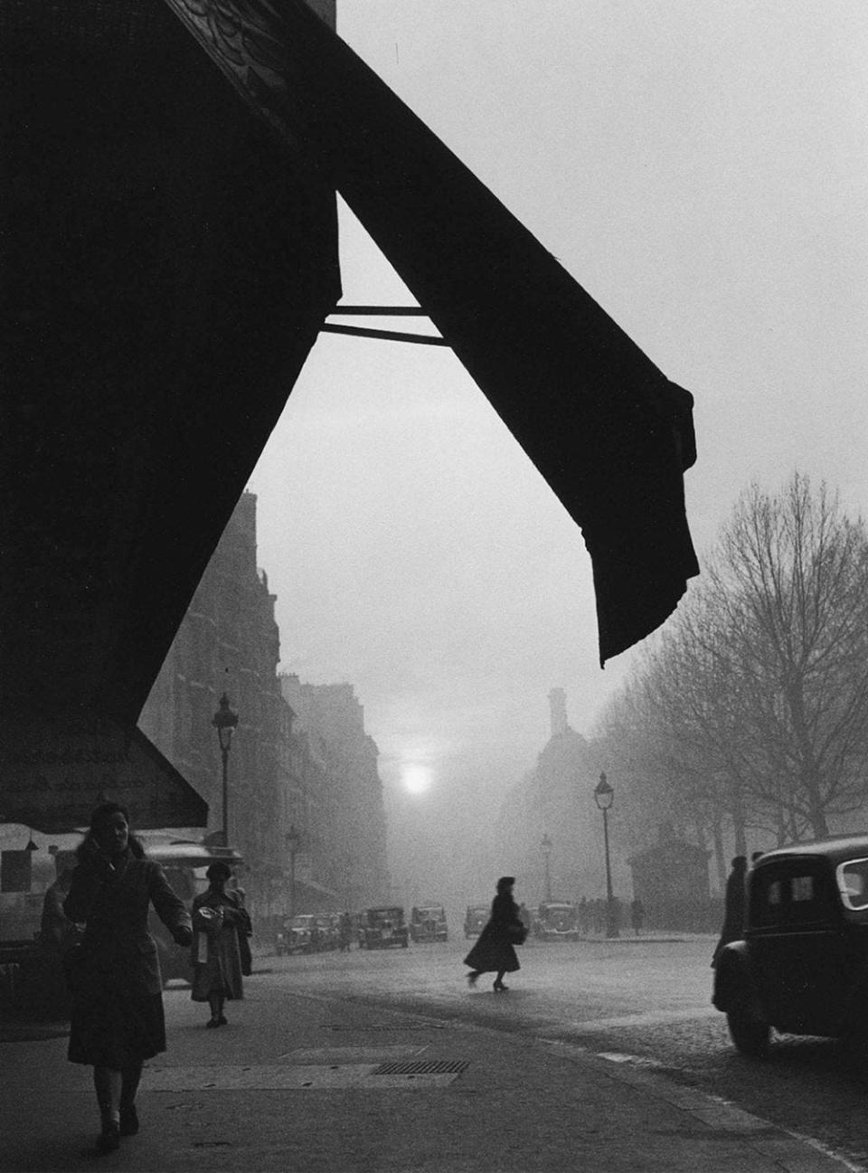 "Carrefour, Sèvres-Babylone, Paris," (1948) by Willy Ronis, is on view at the Holden Luntz Gallery through June 8.