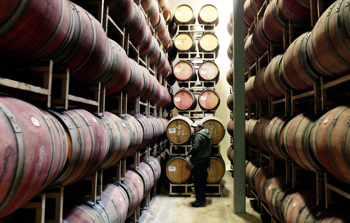 This 2022 file photo shows a wine barrel storage room at Chateau Ste. Michelle’s Canoe Ridge Estate winery in Paterson.