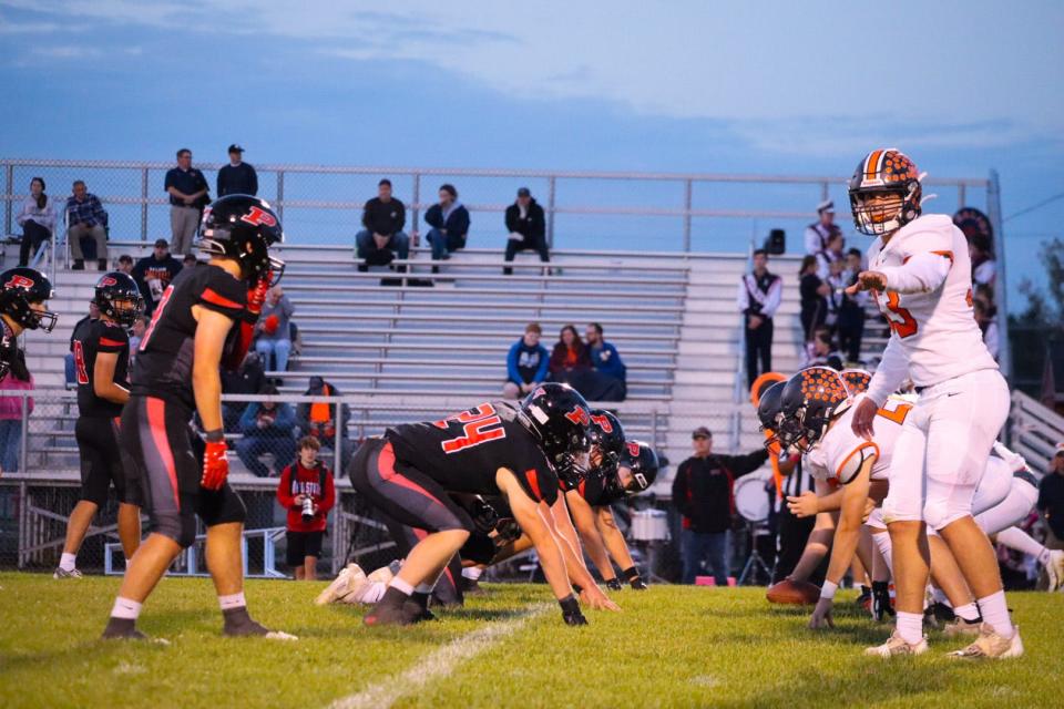 Galion's offense lines up against Pleasant's defense Friday night at Pleasant in a Mid Ohio Athletic Conference football game.