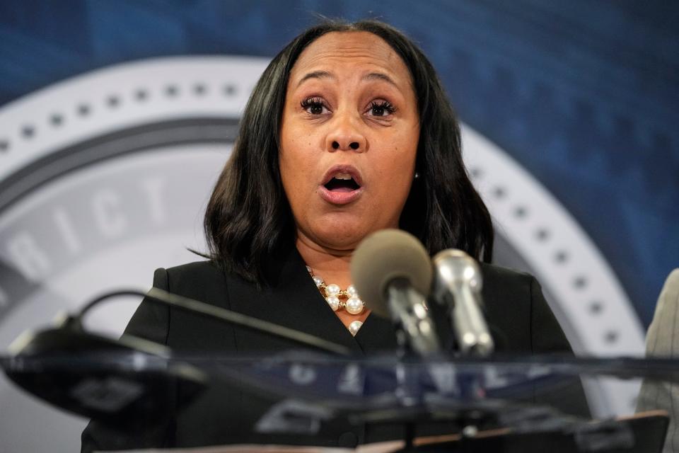 Fulton County District Attorney Fani Willis speaks in the Fulton County Government Center during a news conference, Monday, Aug. 14, 2023, in Atlanta. Donald Trump and several allies have been indicted in Georgia over efforts to overturn his 2020 election loss in the state.