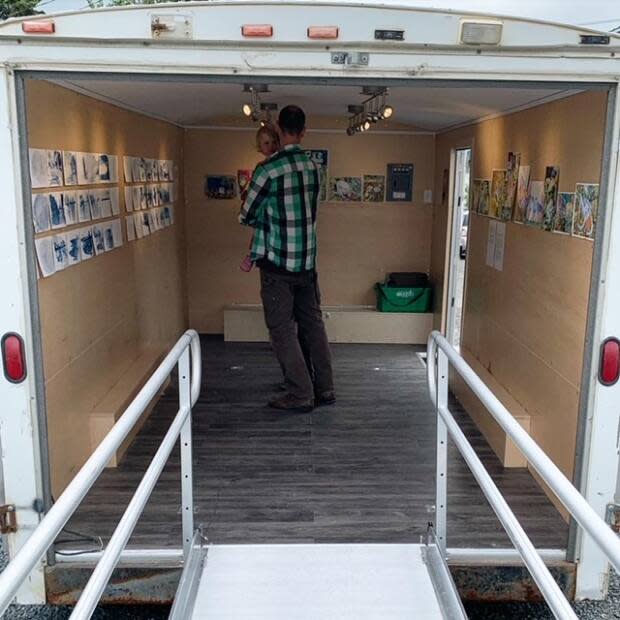 Currently, the Art Gallery of the N.W.T. operates out of a 16-by-8 foot trailer. Here, visitors take a look at exhibition by Yellowknife's Alison McCreesh and Yukon's Kim Edgar in Yellowknife last July.