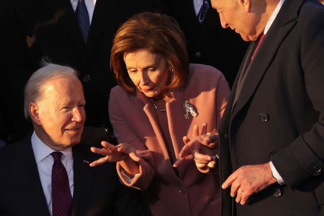 Biden, House Speaker Nancy Pelosi (D-Calif.) and Senate Majority Leader Chuck Schumer (D-N.Y.) at November's signing ceremony for the Infrastructure Investment and Jobs Act. Manchin's opposition to the House version of Build Back Better may force them to make the kind of choices among Democratic initiatives they had hoped to avoid. (Photo: Alex Wong via Getty Images)