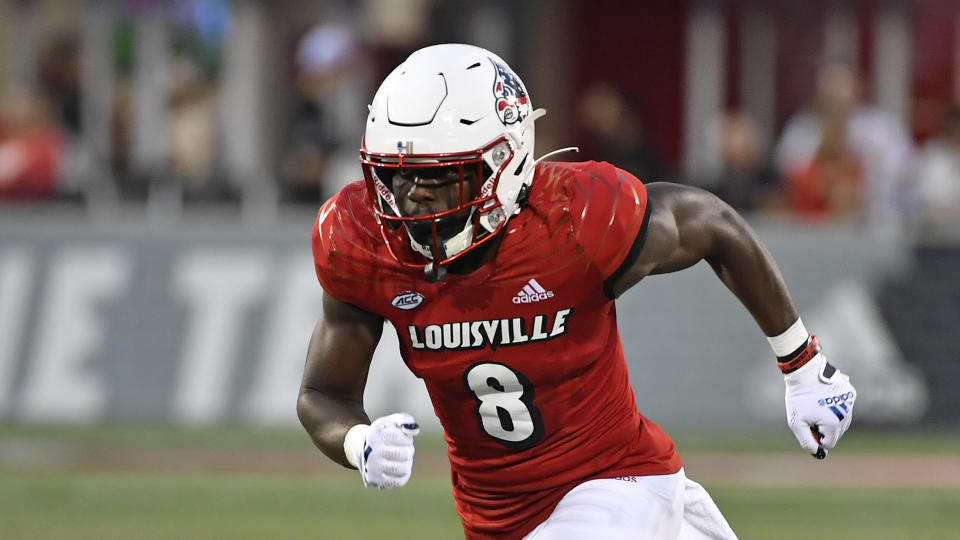 Louisville wide receiver Tyler Harrell (8) runs downfield during the first half of an NCAA college football game in Louisville, Ky., Saturday, Sept. 11, 2021. (AP Photo/Timothy D. Easley)