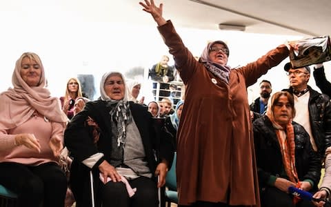 Mothers of Srebrenica's victims clapped when the convictions were read out - Credit:  AFP