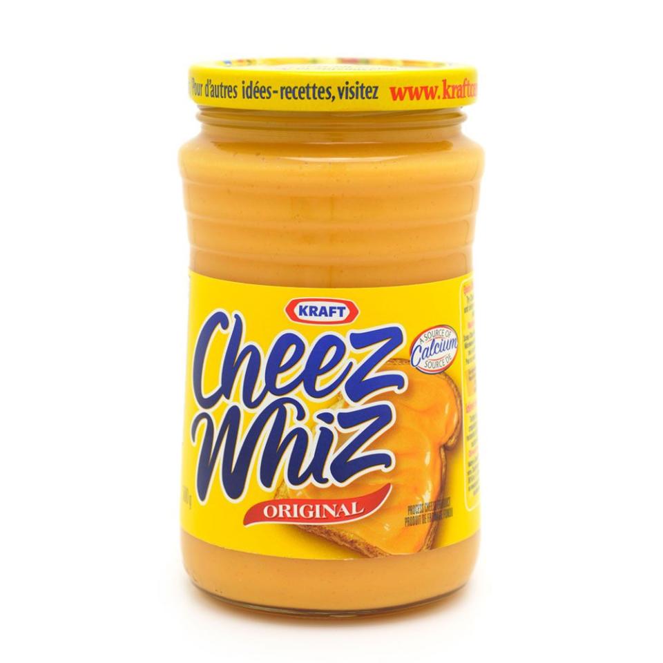 <p>Developed by food scientist Edwin Traisman and sold by Kraft, Cheez Whiz became the processed, shelf-stable cheese sauce that everyone used to top hot dogs, chips, and more. </p>