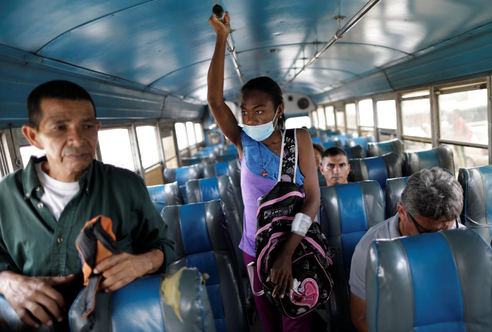 Aidalis Guanipa, 25, a kidney disease patient, travels by bus after a dialysis session at a dialysis center in Maracaibo, Venezuela. "I should have been born rich to be able to buy myself a new kidney," said Guanipa. They get by on her 83-year-old grandmother's pension and from sales of homemade sweets. (Photo: Ueslei Marcelino/Reuters)