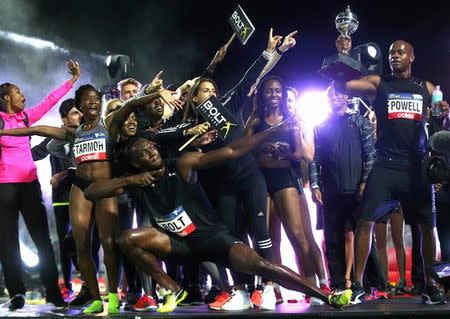 Jamaica's Olympic champion Usain Bolt celebrates with team mates during the final night of the Nitro Athletics series at the Lakeside Stadium in Melbourne, Australia, February 11, 2017. REUTERS/Hamish Blair