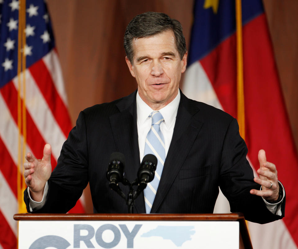 North Carolina Governor-elect Roy Cooper speaks to supporters at a victory rally the day after his Republican opponent and incumbent Pat McCrory conceded in Raleigh, North Carolina, U.S., December 6, 2016. REUTERS/Jonathan Drake - RTSUZS8