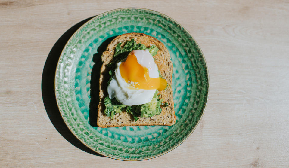 A poached egg on avocado toast.