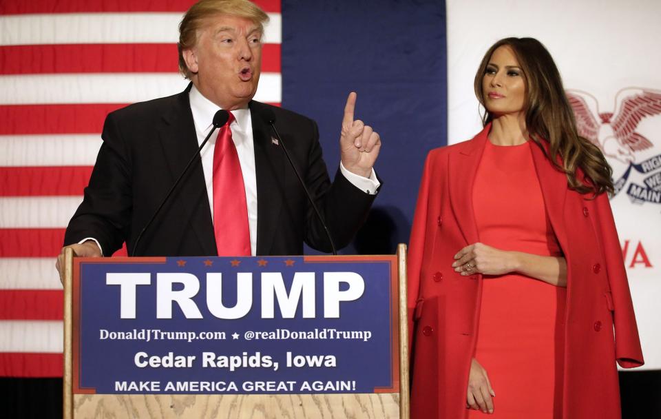 <p>Accompanying her husband on his campaign tour, the new First Lady donned a bright red coat and dress combination, ensuring she stood out on stage. <i>[Photo: Getty]</i> </p>