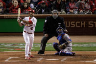 ST LOUIS, MO - OCTOBER 27: Lance Berkman #12 of the St. Louis Cardinals hits a two-run home run in the first inning off of Colby Lewis #48 of the Texas Rangers during Game Six of the MLB World Series at Busch Stadium on October 27, 2011 in St Louis, Missouri. (Photo by Rob Carr/Getty Images)