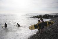 Tourists take surfing lessons at Makaha beach on Lima's Green Coast<br><br> <p>Read more: <a href="http://in.lifestyle.yahoo.com/travel-postcard-48-hours-lima-peru-101853822.html" data-ylk="slk:Travel Postcard - 48 hours in Lima, Peru;elm:context_link;itc:0;sec:content-canvas;outcm:mb_qualified_link;_E:mb_qualified_link;ct:story;" class="link  yahoo-link">Travel Postcard - 48 hours in Lima, Peru</a></p>