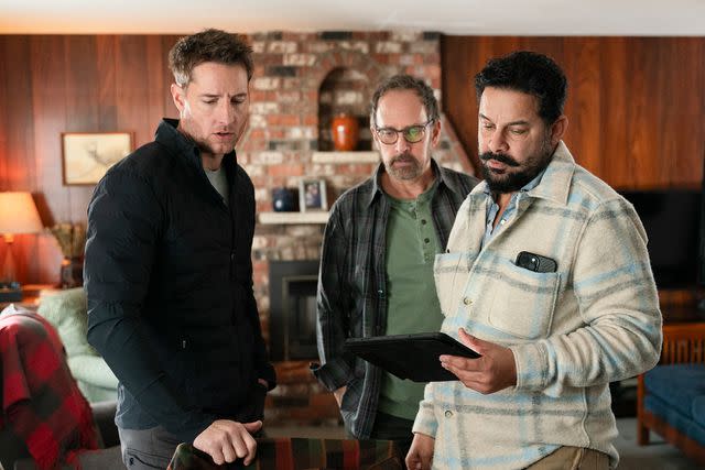 <p>Michael Courtney/CBS via Getty</p> From left to right: Justin Hartley, Gavin Russo and director Jon Huertas on set of 'Tracker'