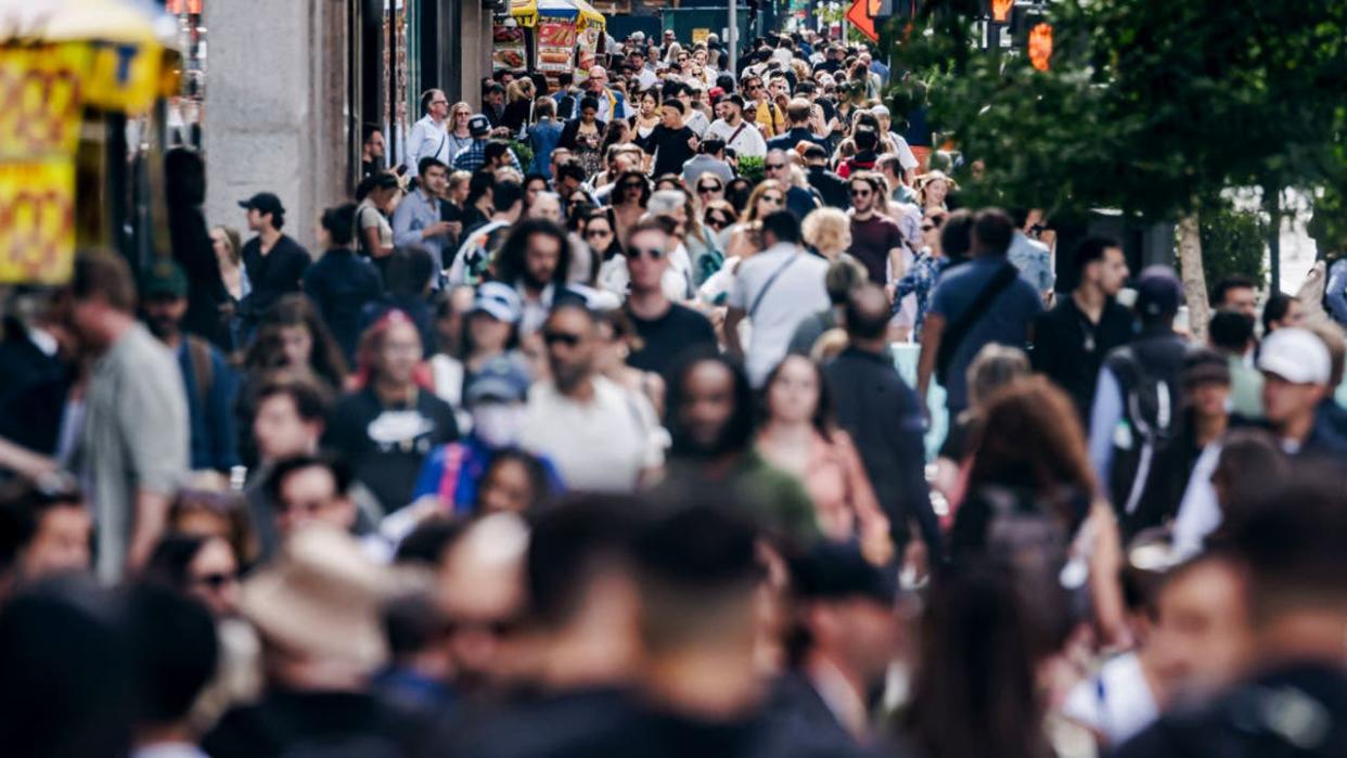 <div>NEW YORK CITY, UNITED STATES - SEPTEMBER 16: People walk on the sidewalk on Fifth Avenue on September 16, 2023 in New York City, United States. (Photo by Thomas Trutschel/Photothek via Getty Images)</div>
