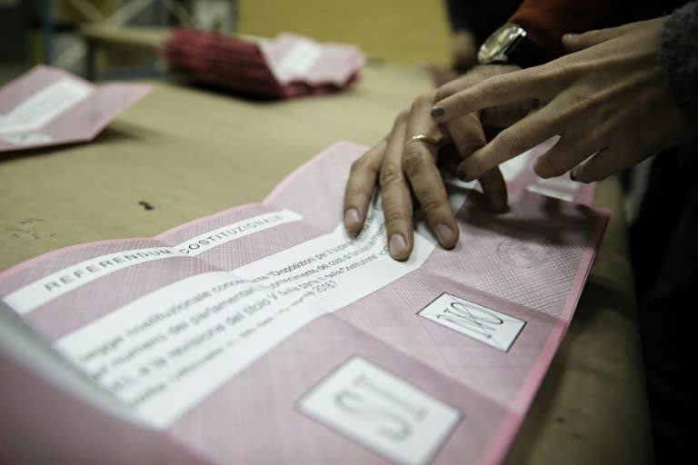 Ballots are counted at the end of the vote for a referendum on constitutional reforms, on December 4, 2016 in a polling station in Saluzzo near Turin