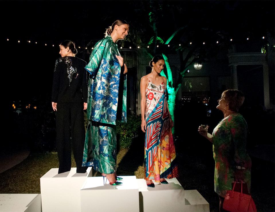 Models wear Libertine Fashion during the Holiday Reveal Event and Tree Lighting event with Libertine designer Johnson Hartig Thursday at the Royal Poinciana Plaza.