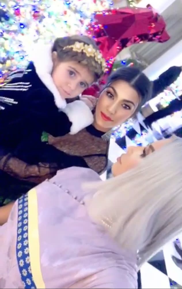 From left: Penelope Disick, Kourtney Kardashian and Kim Kardashian West