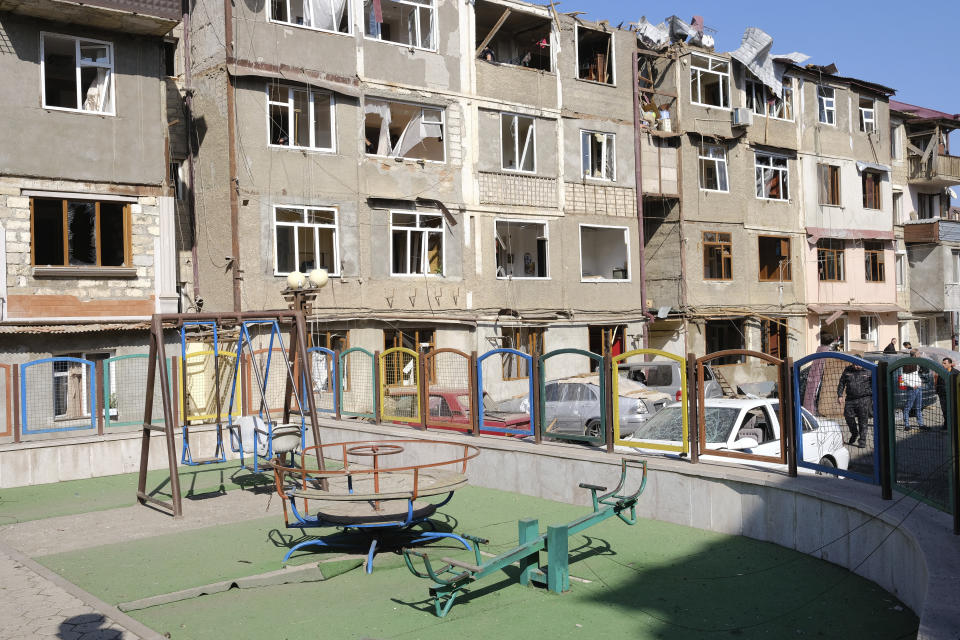 A view of a residential area that was allegedly damaged by shelling during a military conflict in self-proclaimed Republic of Nagorno-Karabakh, Stepanakert, Azerbaijan, Saturday, Oct. 3, 2020. Armenia and Azerbaijan on Saturday said heavy fighting is continuing in their conflict over the separatist territory of Nagorno-Karabakh. Azerbaijan's president criticized the international mediators who have tried for decades to resolve the dispute. Fighting that started Sept. 27 is the worst to afflict Nagorno-Karabakh and surrounding areas since the 1994 end of a war that left the region in Azerbaijan under the control of ethnic Armenian local forces backed by Armenia. (Aram Kirakosyan/PAN Photo via AP)