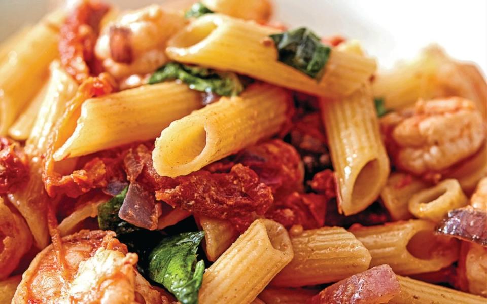 <p>Parade</p><p>A modest amount of Calabrian chile paste and chopped sun-dried tomatoes deliver bold, zesty flavor to this pasta with plump shrimp. </p><p><strong>Get the recipe: <a href="https://parade.com/1178287/alison-ashton/giada-de-laurentiis-penne-with-spicy-calabrian-shrimp/" rel="nofollow noopener" target="_blank" data-ylk="slk:Giada De Laurentiis' Penne With Spicy Calabrian Shrimp;elm:context_link;itc:0;sec:content-canvas" class="link ">Giada De Laurentiis' Penne With Spicy Calabrian Shrimp</a></strong></p>