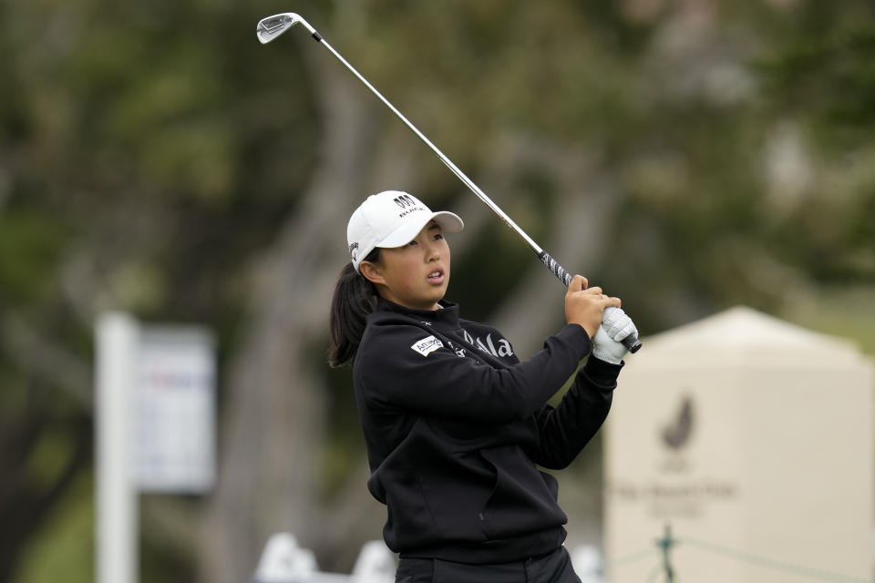 Ruoning Yin, of China, watches her tee shot on the 17th hole during a practice round for the U.S. Women's Open golf tournament at the Pebble Beach Golf Links, Wednesday, July 5, 2023, in Pebble Beach, Calif. (AP Photo/Godofredo A. Vásquez)