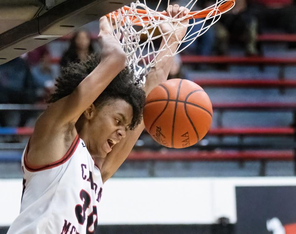 McKinley’s Reed Sims Jr. dunks against Jackson on Tuesday, Jan. 9, 2024.