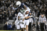 Penn State cornerback Kalen King (4) breaks up a pass intended for Michigan State tight end Daniel Barker (9) during the first half of an NCAA college football game, Saturday, Nov. 26, 2022, in State College, Pa. (AP Photo/Barry Reeger)