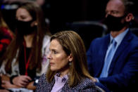 Supreme Court nominee Amy Coney Barrett listens during a confirmation hearing before the Senate Judiciary Committee, Wednesday, Oct. 14, 2020, on Capitol Hill in Washington. (Hilary Swift/The New York Times via AP, Pool)