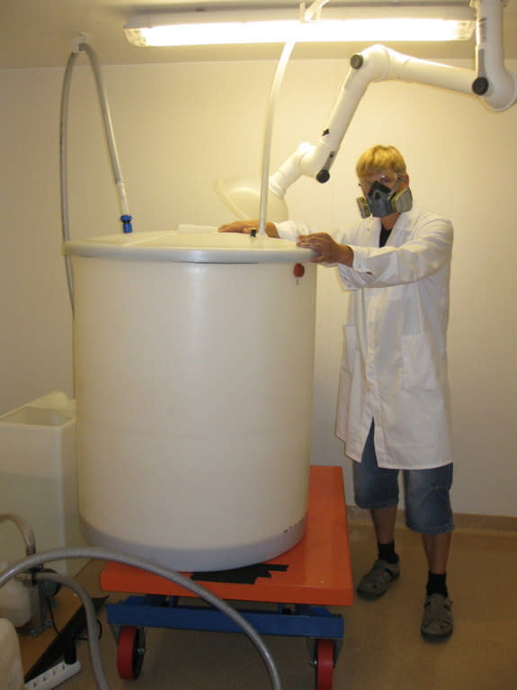 Fredrik Terfelt, a research engineer in the project, seen here in the lab using acid to dissolve rocks in search of the meteorite spinels.