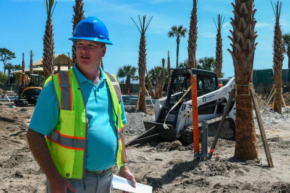 Jay Wiendl, general manager of Beach House Hilton Head Island, explains on Tuesday, April 9, 2024, that wood from the former Tiki Hut will be cut down to coaster sized drink holders and will feature a Tiki Hut logo on the top.