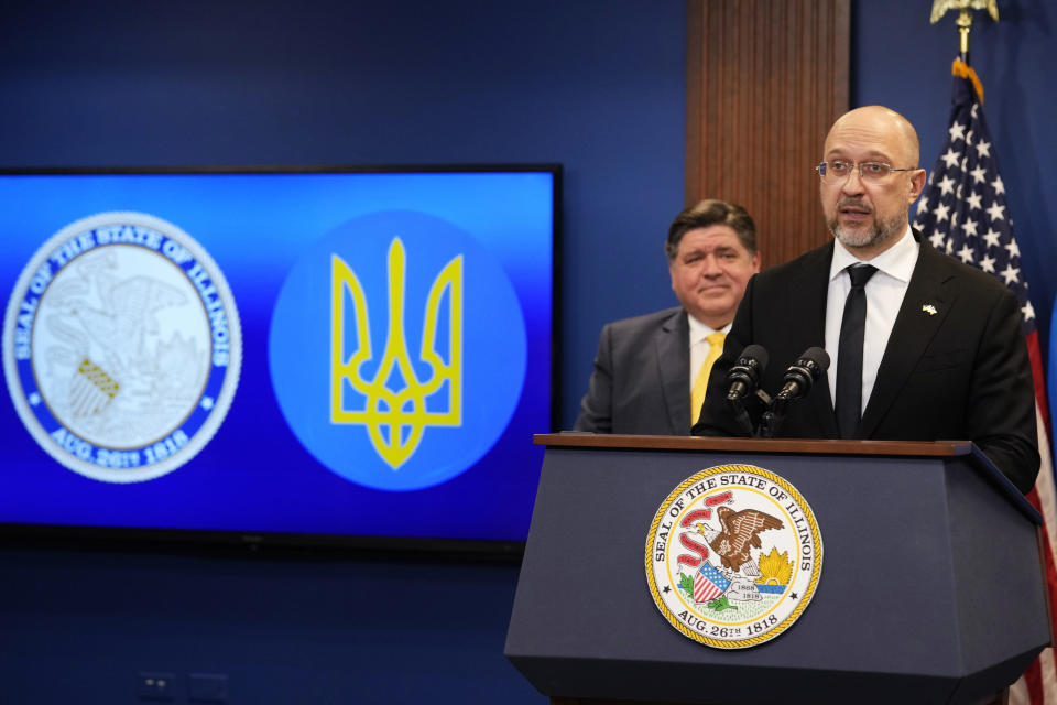 Ukrainian Prime Minister Denys Shmyhal, right, speaks as Illinois Gov. J.B. Pritzker listens at a news conference in Chicago, Tuesday, April 16, 2024. They delivered joint remarks recognizing the Illinois-Ukraine partnership. (AP Photo/Nam Y. Huh)