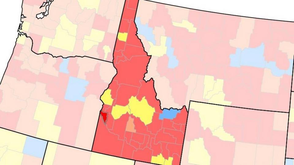 The U.S. Centers for Disease Control’s county-by-county map of the rate of community transmission of COVID-19 on Thursday. Red means a high transmission rate, orange-pink a “substantial” rate, yellow a moderate rate, and blue a low rate. Canyon County, one of the red counties, is marked with a thick border.