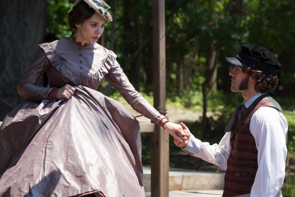 This photo released by Roadside Attractions shows Elizabeth Olsen, left, as Therese Raquin and Oscar Isaac, as Laurent LeClaire, in director and screenwriter, Charlie Stratton's film, "In Secret." The story is based on Emile Zola's novel, "Therese Raquin." (AP Photo/Roadside Attractions, Phil Bray)