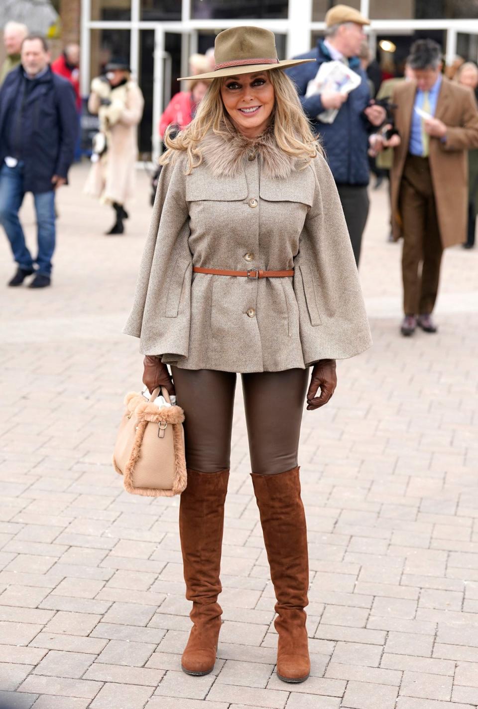 Robin Hood but make it chic: Carol Voderman at Cheltenham (PA)