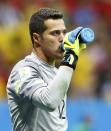 Brazil's goalkeeper Julio Cesar takes a drink during their 2014 World Cup third-place playoff against the Netherlands at the Brasilia national stadium in Brasilia July 12, 2014. REUTERS/Dominic Ebenbichler (BRAZIL - Tags: SOCCER SPORT WORLD CUP)