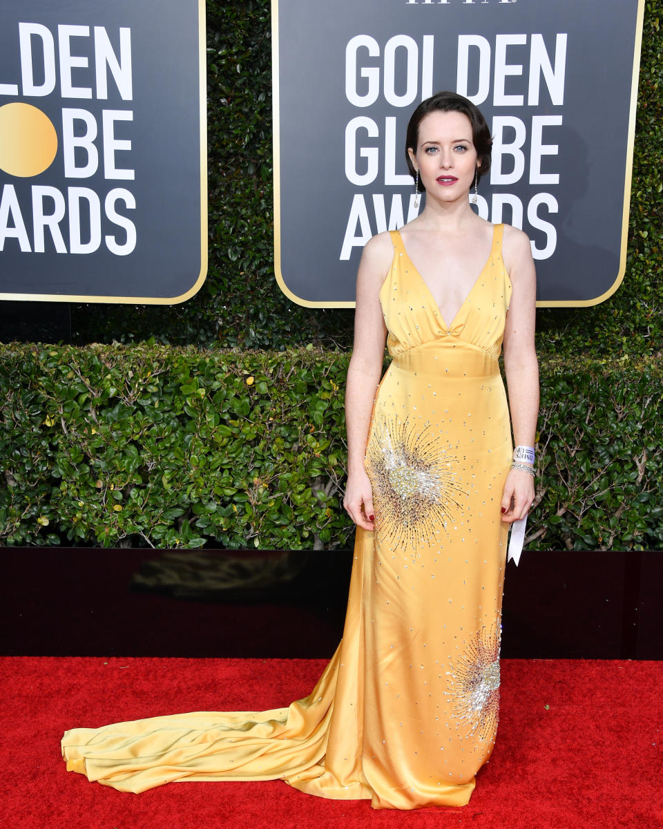 <p>On January 6, Claire Foy delivered one of her greatest looks to date in a silky Miu Miu dress. <em>[Photo: Getty]</em> </p>