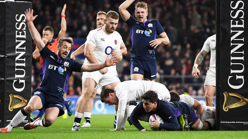 Sam Johnson crosses to give Scotland the lead. (Photo by Shaun Botterill/Getty Images)