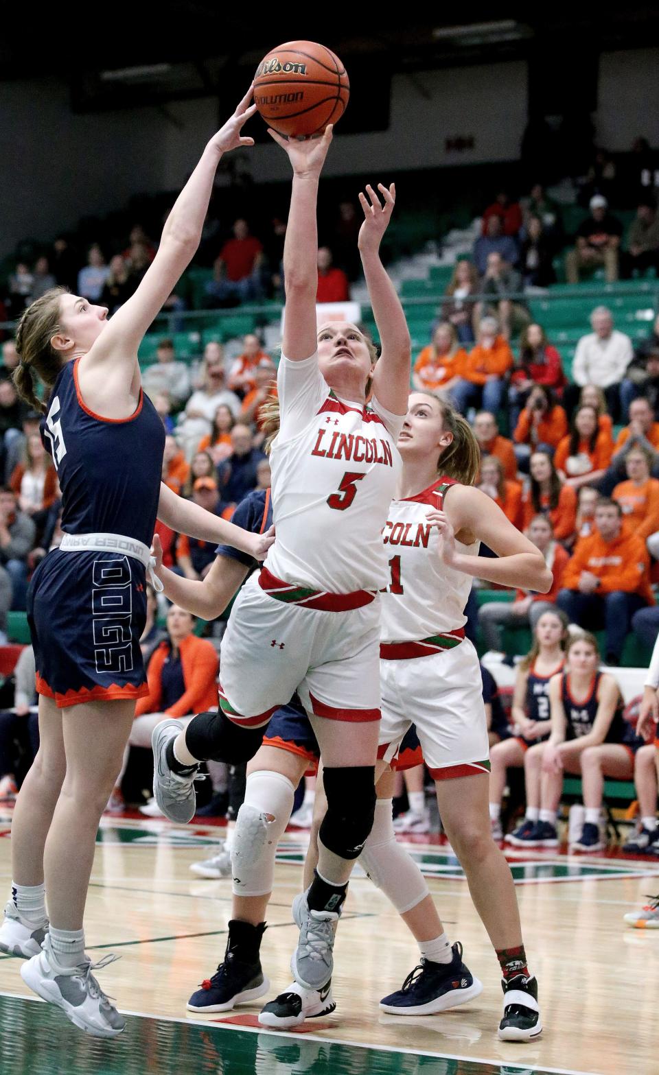 Lincoln Community High School's Kloe Frobe goes up for a shot during the game against Mahomet-Seymour High School Friday Feb. 25, 2022. [Thomas J. Turney/ The State Journal-Register]