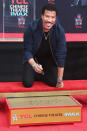 <p>The new <em>American Idol</em> judge flashed a killer smile as he was celebrated with a Hand And Footprint Ceremony at theTCL Chinese Theatre in Hollywood, Calif. on Wednesday. (Photo: Tommaso Boddi/Getty Images) </p>
