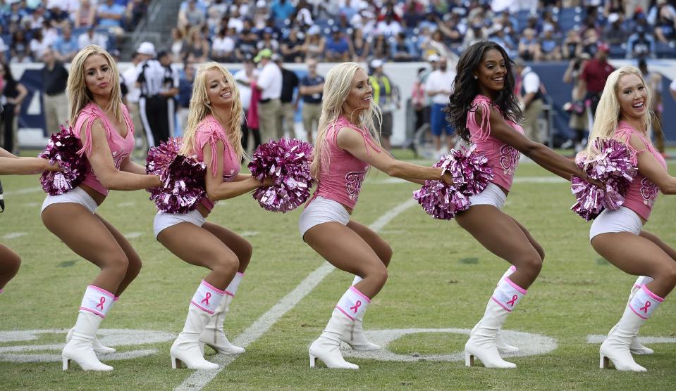 <p>Tennessee Titans cheerleaders perform in pink uniforms for breast cancer awareness in the first half of an NFL football game between the Titans and the Cleveland Browns Sunday, Oct. 16, 2016, in Nashville, Tenn. (AP Photo/Mark Zaleski) </p>