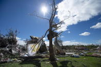 <p>A child’s blanket and building materials are tangled in a tree in a neighbourhood destroyed by a tornado in Dunrobin, Ont., west of Ottawa, on Saturday, Sept. 22, 2018. The storm tore roofs off of homes, overturned cars and felled power lines in the Ottawa community of Dunrobin and in Gatineau, Que. (Photo from Justin Tang/The Canadian Press) </p>