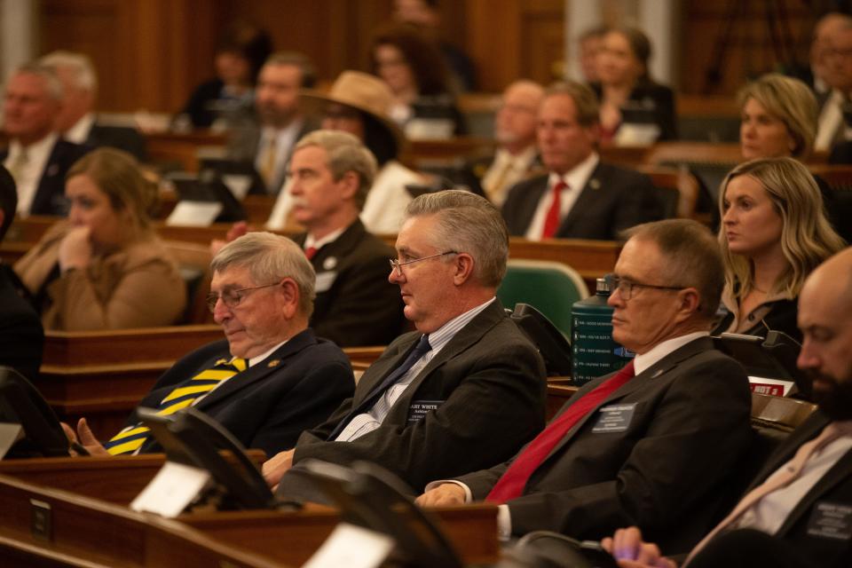 Republican legislative members listen to Gov. Laura Kelly's State of the State address from the House Chambers on Tuesday.