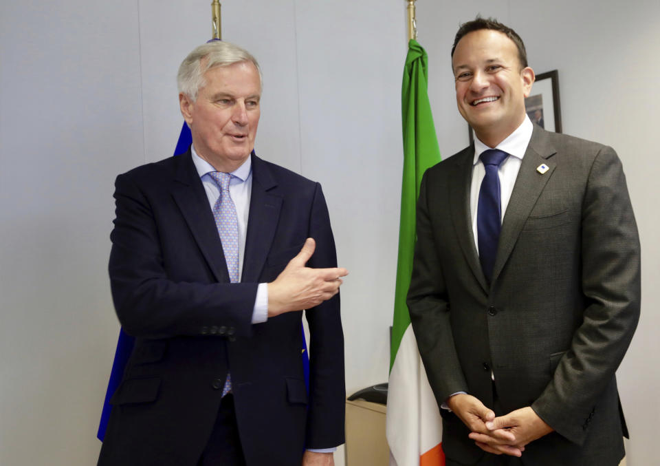 European Union chief Brexit negotiator Michel Barnier, left, speaks with Irish Prime Minister Leo Varadkar prior to a meeting on the sidelines of an EU summit in Brussels, Thursday, June 20, 2019. European Union leaders meet in Brussels for a two-day summit to begin the process of finalizing candidates for the bloc's top jobs. (AP Photo/Olivier Matthys, Pool)