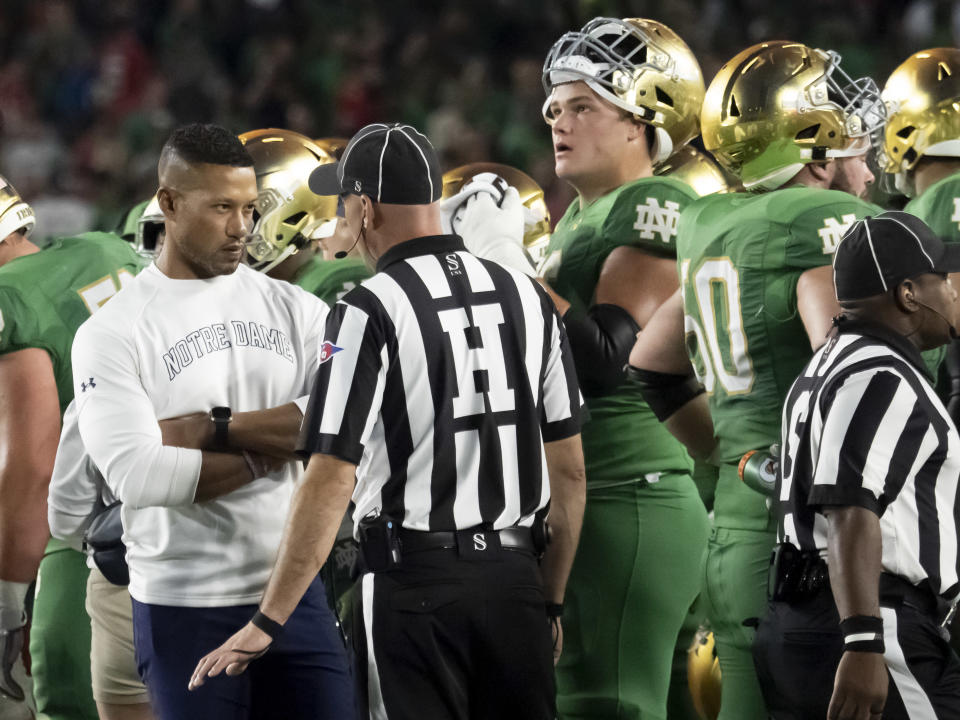 Notre Dame coach Marcus Freeman speaks with an official during his team's loss to Ohio State on Sept. 23. (Joseph Weiser/Icon Sportswire via Getty Images)