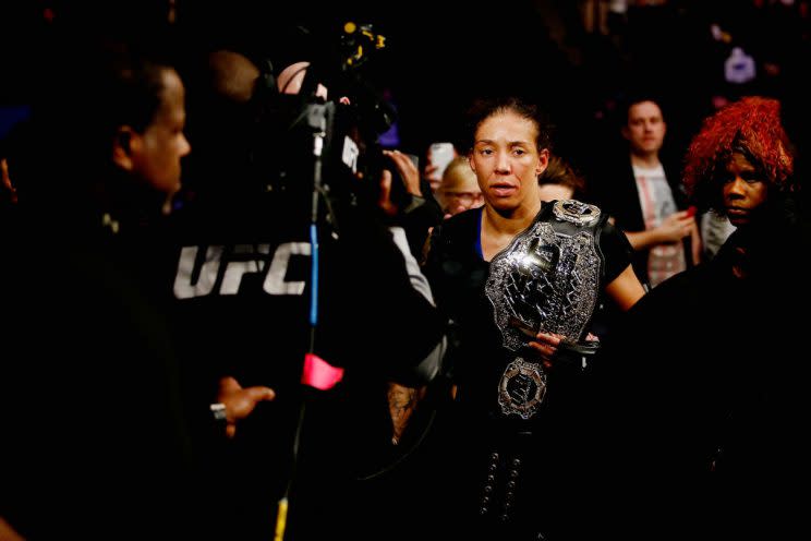 Germaine de Randamie walks through the crowd after beating Holly Holm to win the women's featherweight title. (Getty)