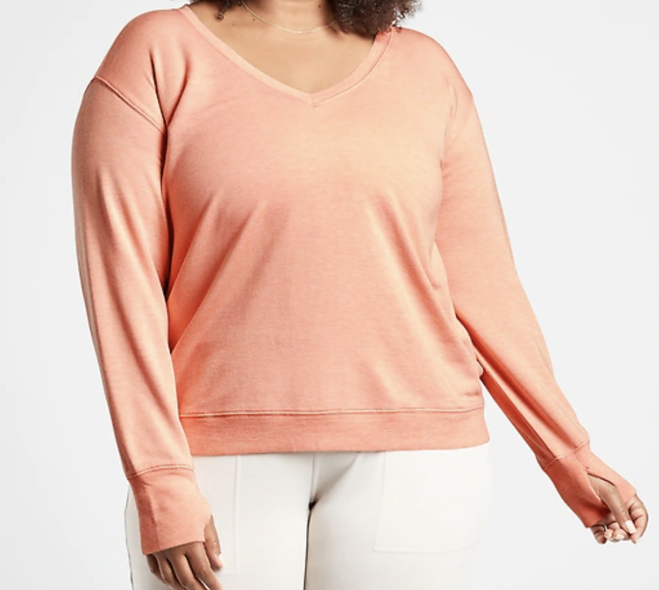 Brighten up chilly fall days with a flattering pop of color. (Photo: Athleta)