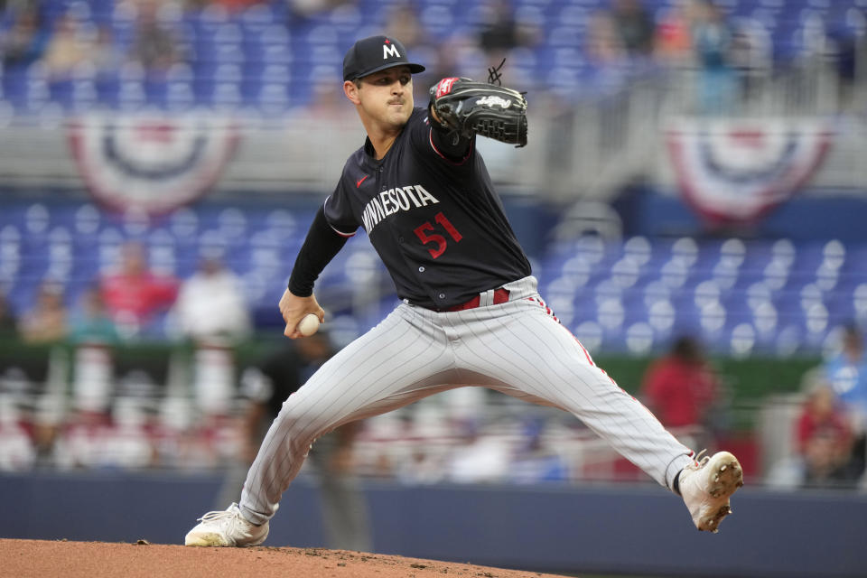 Minnesota Twins starting pitcher Tyler Mahle throws during the first inning of a baseball game against the Miami Marlins, Monday, April 3, 2023, in Miami. (AP Photo/Lynne Sladky)