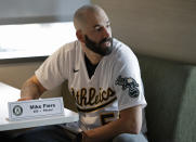 Oakland Athletics pitcher Mike Fiers waits to speak with the media on Friday, Jan. 24, 2020, in Oakland, Calif. Fiers, the Oakland pitcher and whistleblower in the Houston Astros sign-stealing scandal, appeared with teammates and manager Bob Melvin at team offices. Fiers has not spoken publicly about the sign stealing since the story was published in The Athletic in November. (AP Photo/Ben Margot)